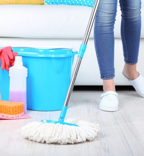 Cleaning floor in room close-up